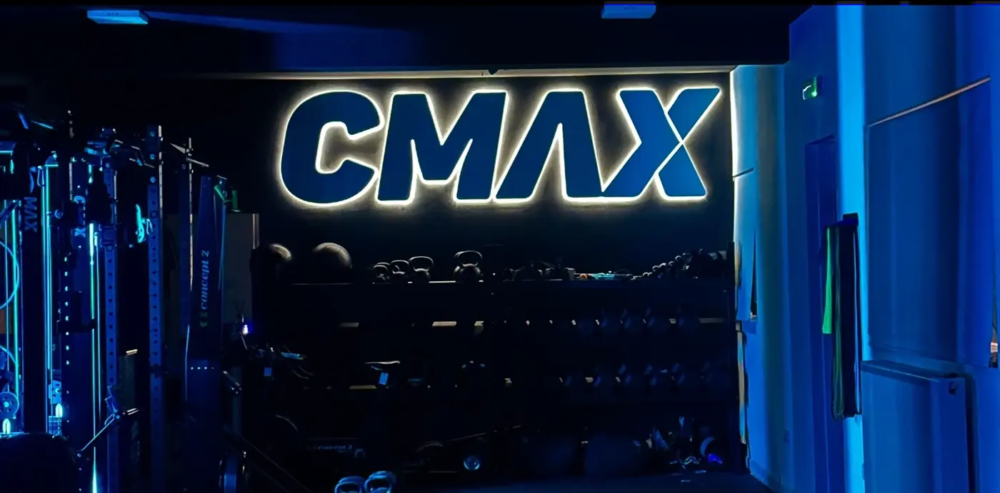 The CMAX sign lit up inside the HUB